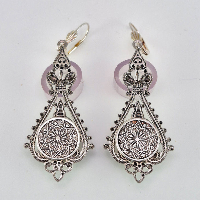 The back side of the sterling silver filled Victorian antique or reproduction work from Arcane Angel.
