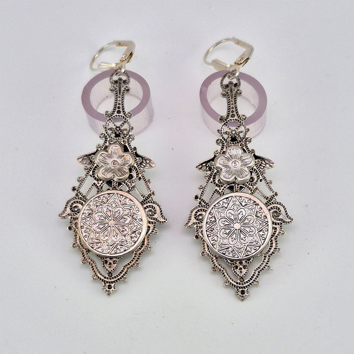 The back side finish of the sterling silver filled Victorian antique or reproduction work from Arcane Angel.