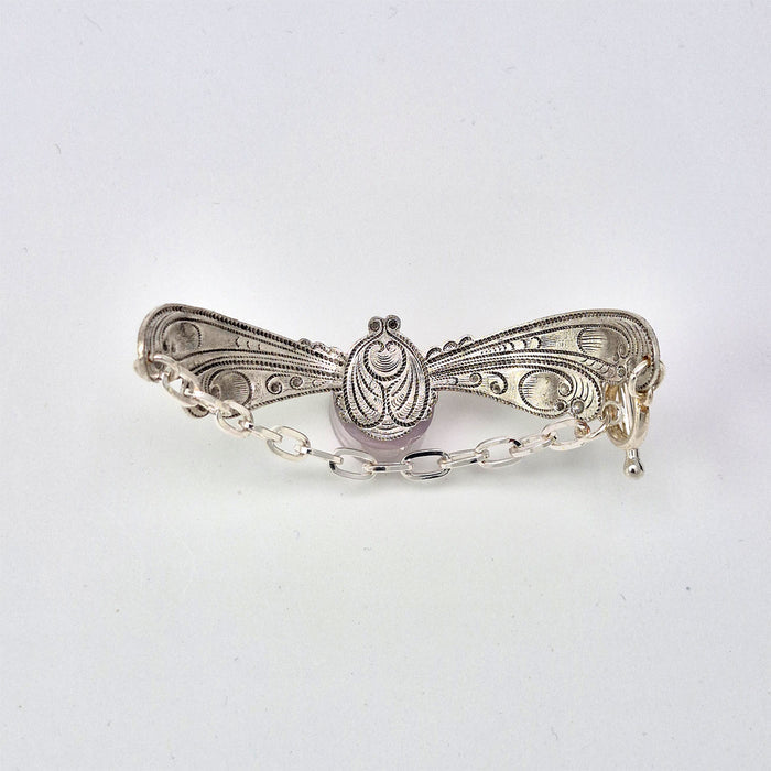 The inside finish of the Heliopolis sterling silver filled Victorian antique or reproduction bracelet from original mold with chain and toggle clasp.