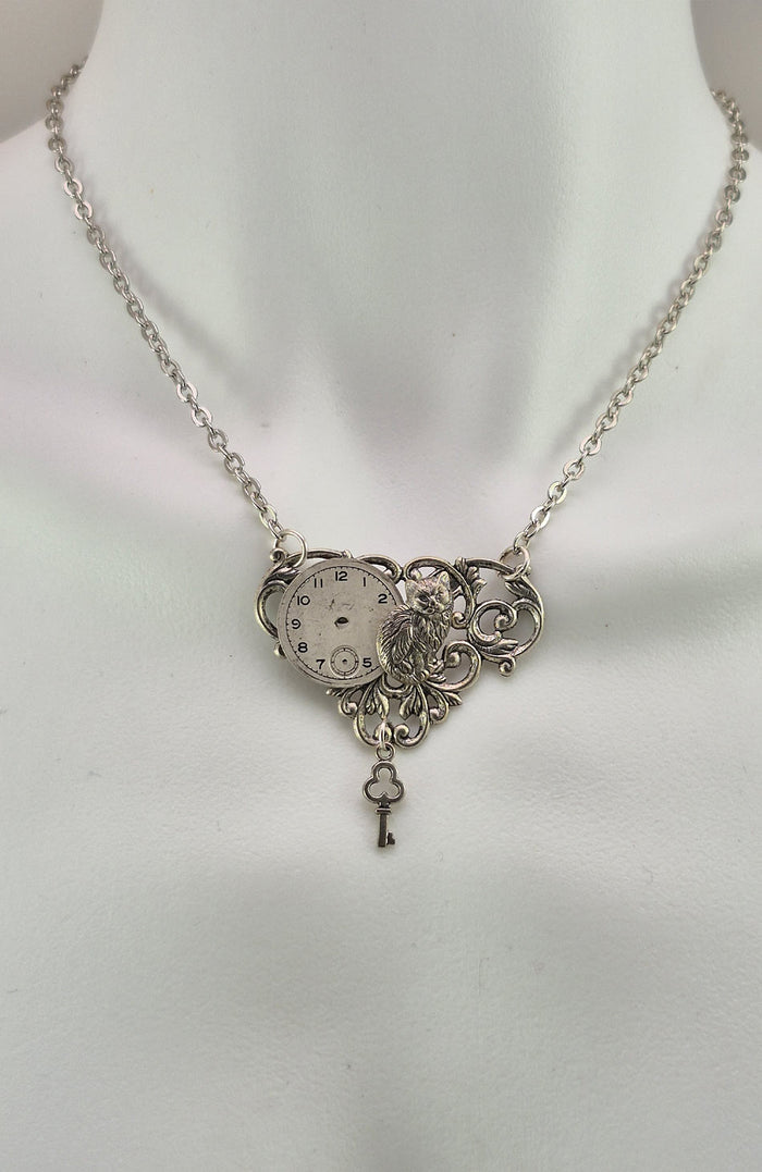 Sterling silver filled Victorian antique or reproduction work from original mold embellished with vintage clockworks and mechanisms.