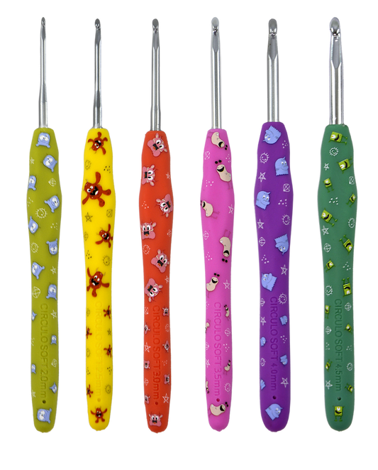 A set of limited edition Circulo crochet hooks with decorative designs on the handles, each in a different color.