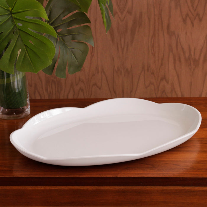 Beatriz Ball Vida Amelia Large Platter White — Empty platter beside large green leaves